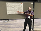Robert exuberantly presenting his poster at the ACS Midwest/Great Lakes Regional Meeting in St. Louis, October 2023